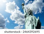 Statue of liberty. Monument in USA. Statue of liberty in New York. Monument from USA under blue sky. Symbol of democracy of united states. Top of statue of liberty close-up. Sights of New York